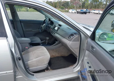 2004 Toyota Camry Le from USA, damaged, VIN 4T1BE32K74U838272